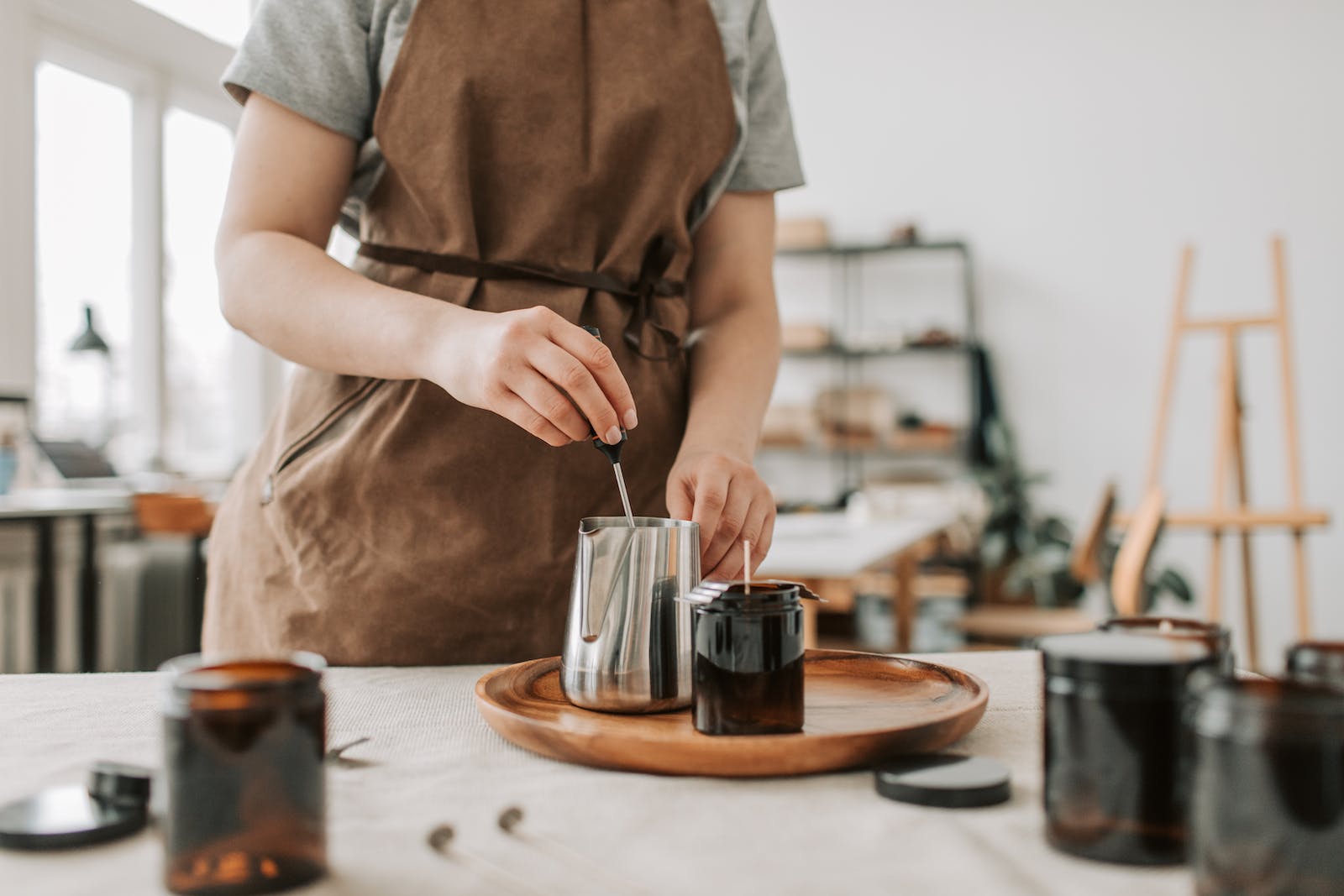 Soy wax being poured into a vessel